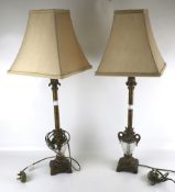 A pair of contemporary gilt metal table lamps.