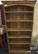 A pine freestanding bookcase.