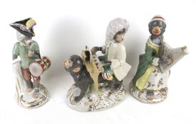Three 20th ceramic figures modelled as monkey musicians.