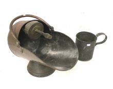 A Victorian copper coal scuttle and a one gallon mug.