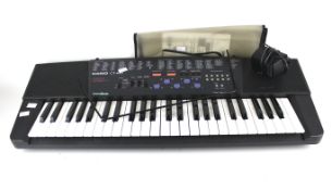 A Casio CT-400 electronic piano keyboard.