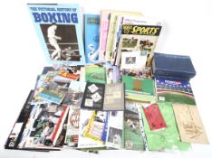 An assortment of sporting ephemera. Including books (some signed), programmes, etc.