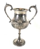 A silver plated twin-handled trophy.
