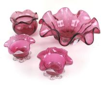Four pieces of 19th century and later Cranberry glassware.
