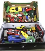 An assortment of playworn diecast vehicles in two boxes. Including Maisto, Bugatti, Matchbox, etc.
