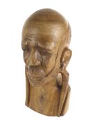 An African hardwood carved bust of an old man.