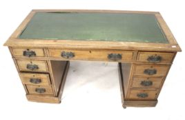An early 20th century mahogany twin pedestal desk.