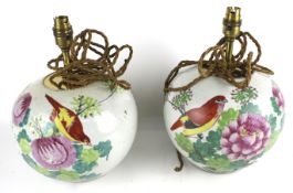 A pair of 20th century Chinese globular vases converted to table lamps.