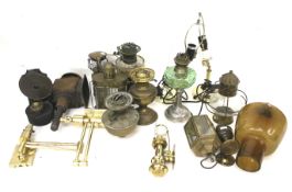 An assortment of Victorian and later lights and oil lamp components.