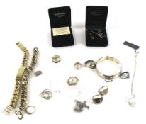 A collection of silver and other jewellery including seven rings.
