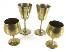 Four silver plated goblets. Comprising two pairs, both with engraved details, Max.