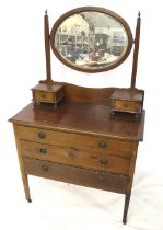 An Edwardian mahogany dressing table.