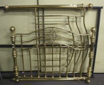 A reproduction brass double bed frame.