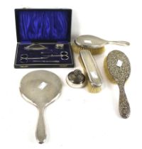 A silver mounted three piece dressing table set and other items;