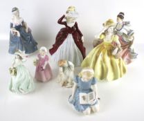 A collection of eight assorted porcelain figures.