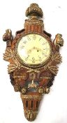 A Westerstrands Original carved wooden pendulum wall clock.