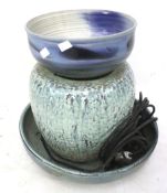 A garden stoneware water feature and a studio pottery bowl.