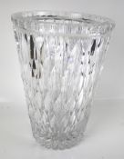 A substantial cut glass vase.