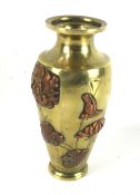A Japanese late Meji period brass vase.