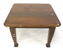 An early 20th century extending dining table with single leaf. On square tapering supports.