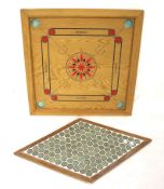 A wooden Carom board and another games board.