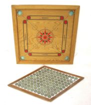 A wooden Carom board and another games board.