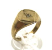 A vintage 9ct gold and diamond signet ring.