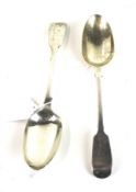 A pair of Victorian silver fiddle pattern table spoons.