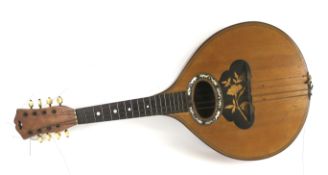 A 20th century musical guitar/string instrument.