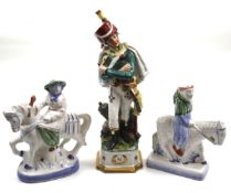 A pair of Rye Pottery figures and a Royal Naples miltary figures. Max.