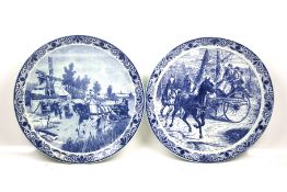 A pair of Delft chargers. Both with horse interest.