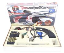 A vintage Matchbox Powertrack 3000 slot car racing set. One controller missing, boxed.