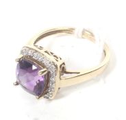 A modern QVC 9ct gold, amethyst and diamond oblong cluster ring.