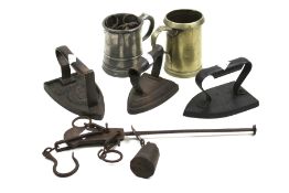 An assortment of Victorian and later metalware. Including flat irons, scales and tankards. Max.