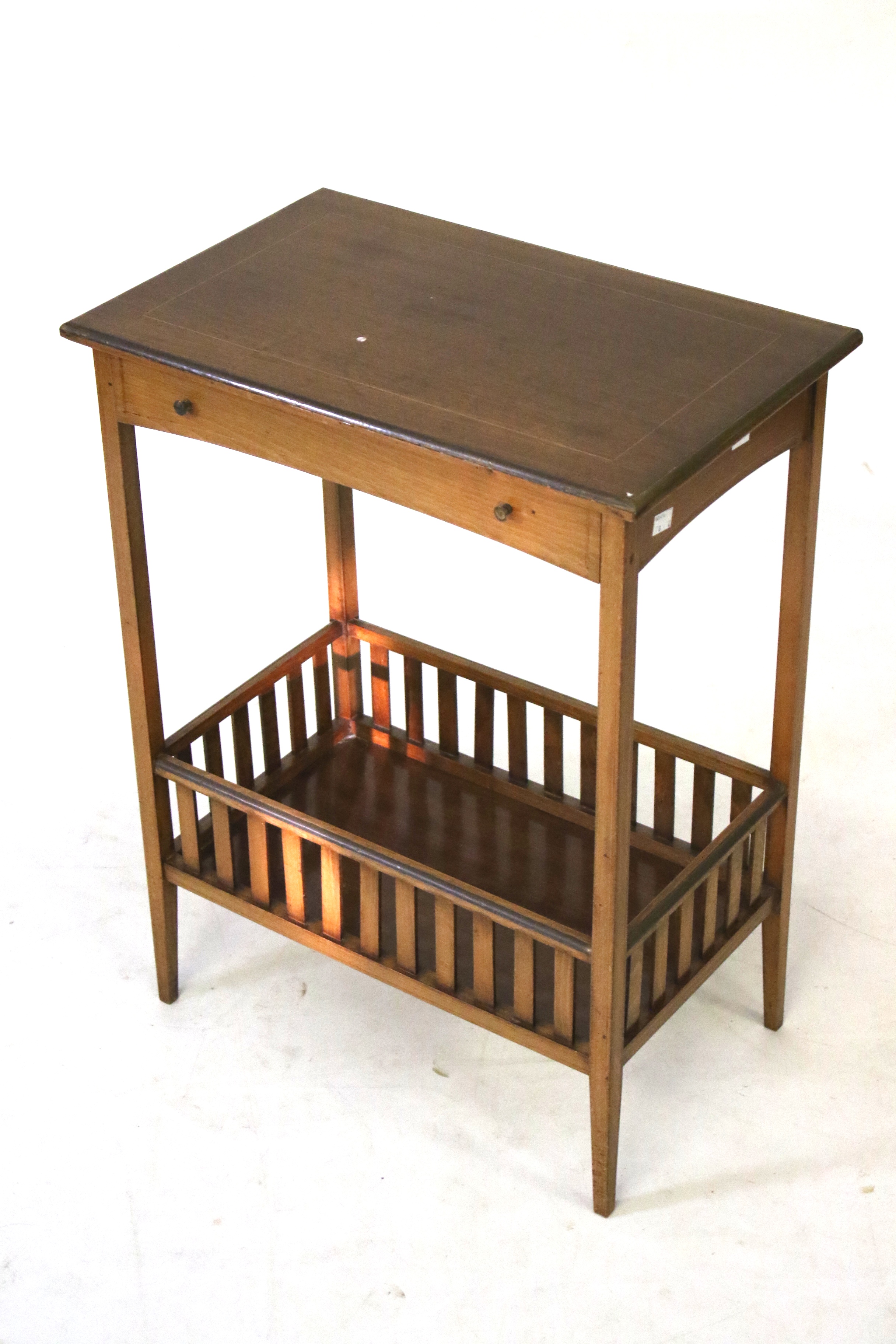 An inlaid mahogany brass bound side table. With a single drawer and galleried lower shelf.