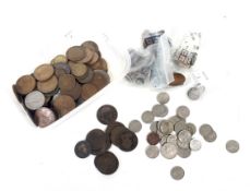 A small collection of pre-1947 silver threepenny pieces and a collection of coins.
