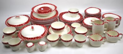 A mid-century Midwinter Pottery 'Stylecraft' red and white domino spot dinner service.