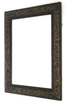 A vintage bevelled edge wall mirror.