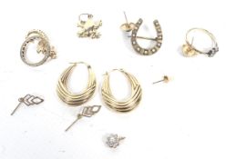 A small collection of 9ct gold and other jewellery including a pair of Italian fluted-hoop earrings.
