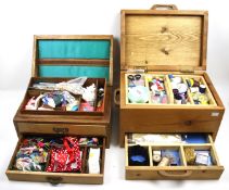 Two wooden sewing work boxes including contents. Both with hinged lid and one or two drawers.