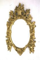 A bevelled edge Georgian style mirror.