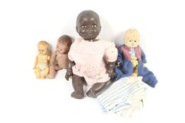 Four vintage dolls and some clothing. Including Rodnoid examples. Max.