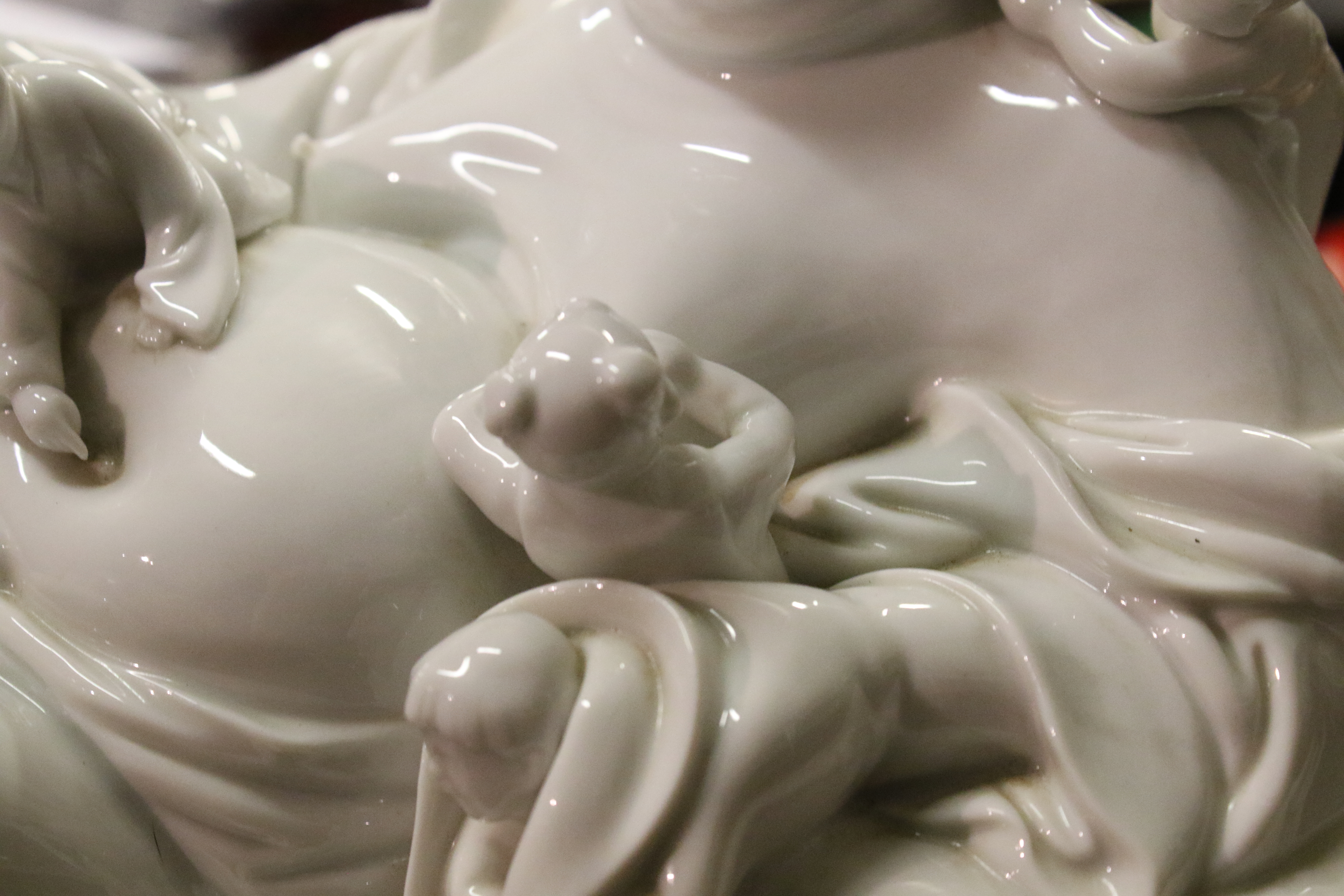 A 20th century Chinese Blanc de Chine figure of laughing Buddha with five children. - Image 11 of 17