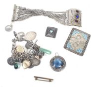 A small collection of jewellery to include two Arts and Crafts brooches.