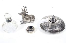 Four silver scent bottles and snuff boxes