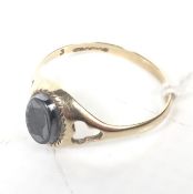 A vintage 9ct gold and oval hematite intaglio ring.