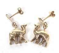 A pair of middle eastern 'camel' shaped pendent earrings.