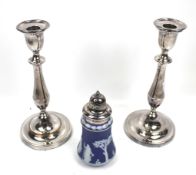 A pair of silver-plated copper round candleticks with knopped and baluster stems and decorative