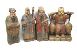 Four large contemporary painted wood carvings of Chinese figures. Including Shoulao. Max.