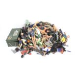 A mixed collection of Action Man figures and accessories.